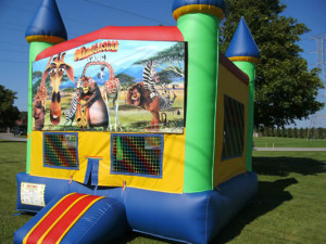 Big-Bounce-Rentals-Rainbow-Castle-Madagascar-Theme-2